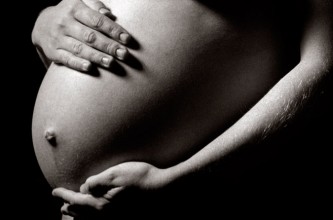 Maternity Pregnant belly with hands