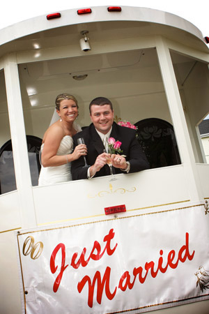bridal couple on trolley just married